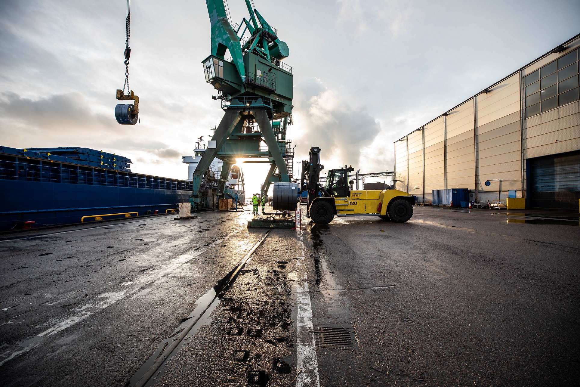 STRONG HYSTER TRUCKS FOR METAL COIL HANDLING AT OXELOSUNDS HAMN IN SWEDEN A